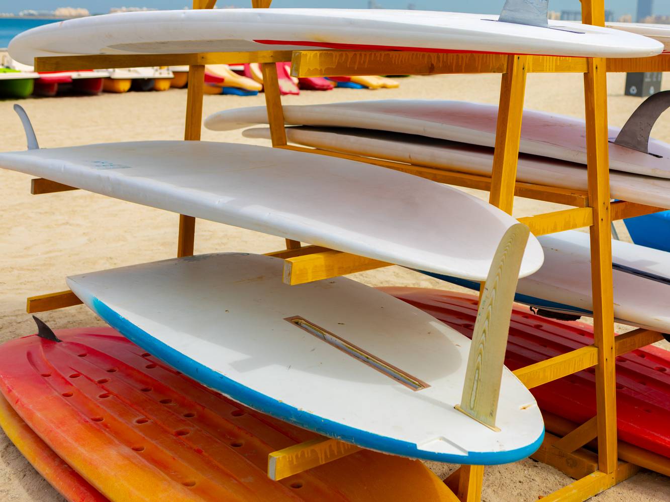 surfboards-stacked-on-the-rack-on-a-beach-2023-11-27-04-51-24-utc